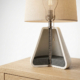 Lamp base with lamp loader